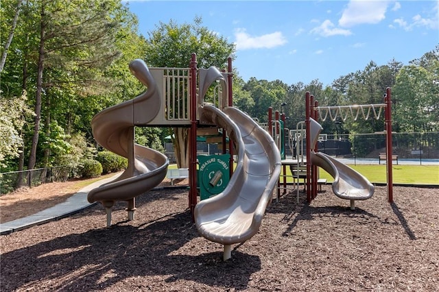 community jungle gym with fence