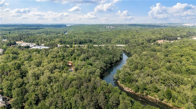 drone / aerial view with a view of trees