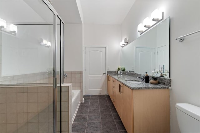390 17th St NW Unit 6036, Atlanta, GA 30363 - bathroom with vanity, a shower stall, a bath, toilet, and tile patterned flooring