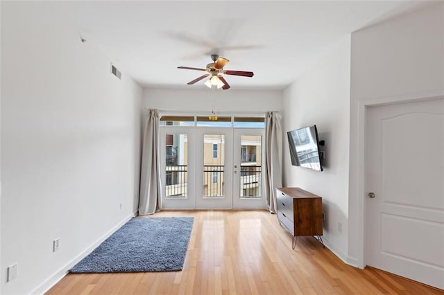 390 17th St NW Unit 6036, Atlanta, GA 30363 - foyer featuring ceiling fan, light wood-type flooring, french doors, and baseboards