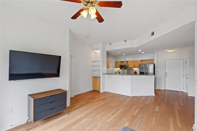 390 17th St NW Unit 6036, Atlanta, GA 30363 - unfurnished living room featuring light wood finished floors, ceiling fan, baseboards, and recessed lighting