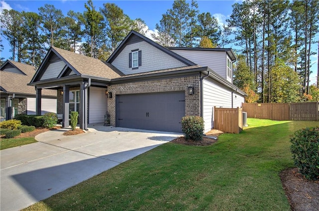 view of front facade featuring a garage and a front lawn