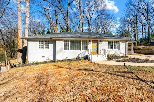 ranch-style house with a front yard