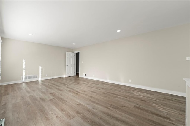 unfurnished room featuring light wood-type flooring