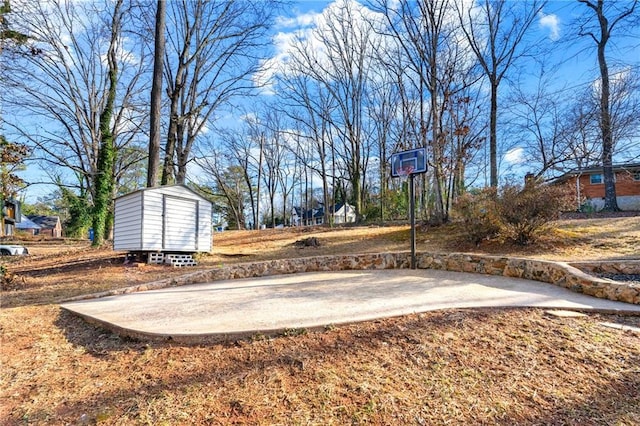 exterior space with basketball hoop