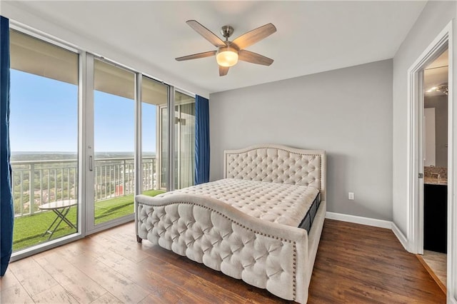 bedroom with hardwood / wood-style flooring, ceiling fan, and access to outside