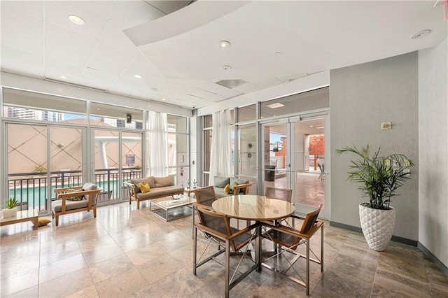 interior space featuring french doors and a healthy amount of sunlight