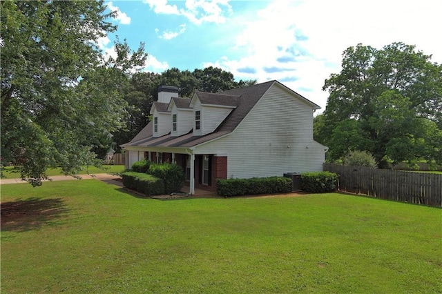 1012 Gloria Grand Blvd, Mcdonough, GA 30252 - view of side of home featuring a chimney, central air condition unit, and a garage