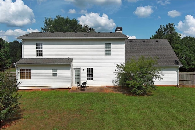 1012 Gloria Grand Blvd, Mcdonough, GA 30252 - back of house featuring a chimney and a patio