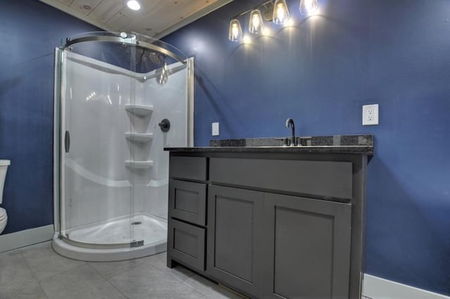 bathroom with walk in shower, vanity, and toilet