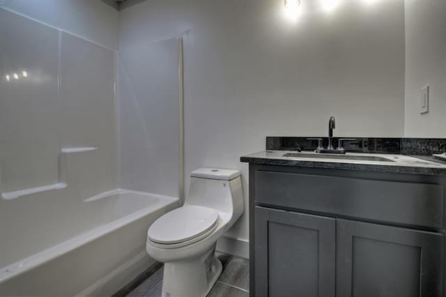 full bathroom with vanity, toilet, and tub / shower combination