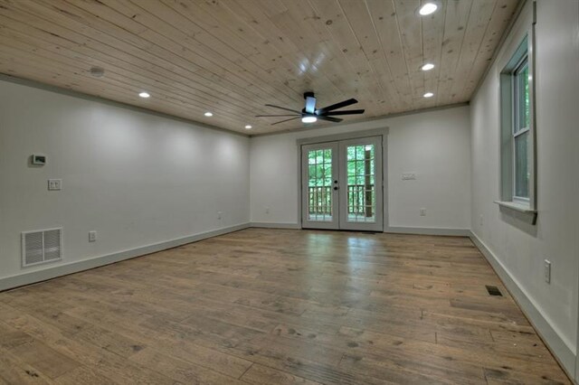 empty room featuring french doors, ceiling fan, wooden ceiling, and light wood-type flooring