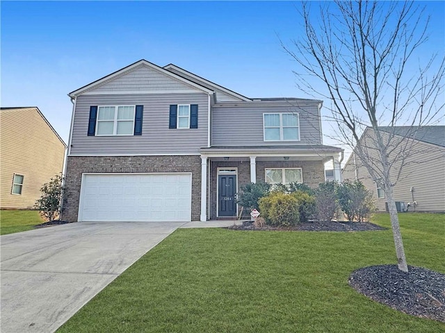 view of front of home with a garage and a front yard