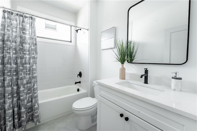 full bathroom with shower / tub combo with curtain, vanity, and toilet