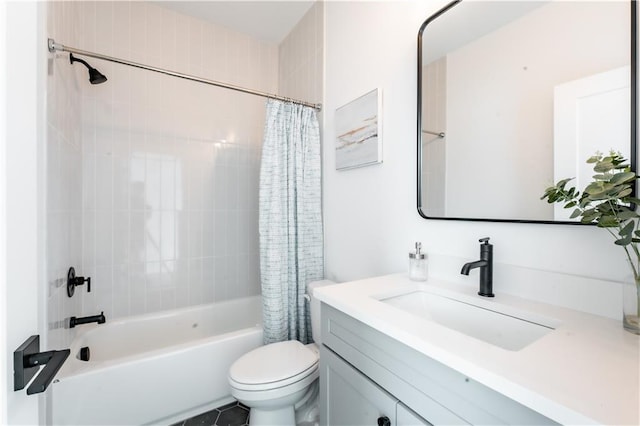 full bathroom with shower / tub combo, vanity, and toilet