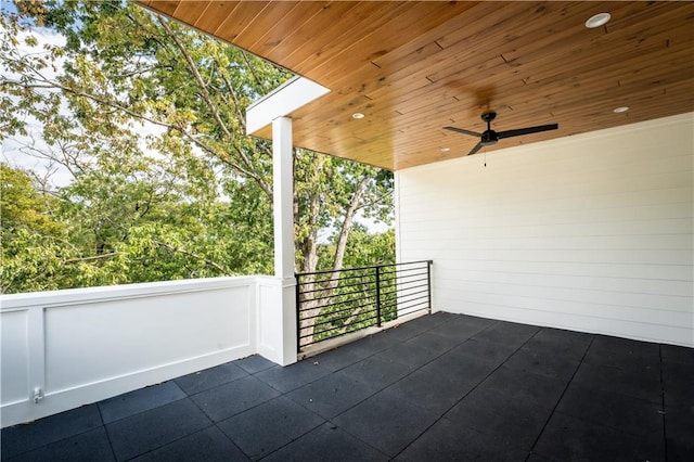 view of patio / terrace featuring ceiling fan and a balcony