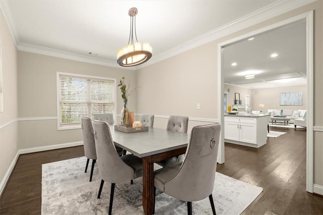 dining space featuring baseboards, ornamental molding, dark wood finished floors, and recessed lighting