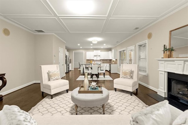 living room featuring a fireplace, baseboards, coffered ceiling, and dark wood-type flooring