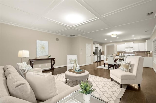 living room featuring recessed lighting, coffered ceiling, visible vents, baseboards, and dark wood finished floors