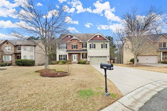 view of front of property with an attached garage, concrete driveway, and a front yard