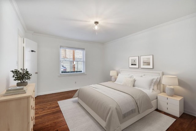 bedroom with crown molding and dark wood-type flooring