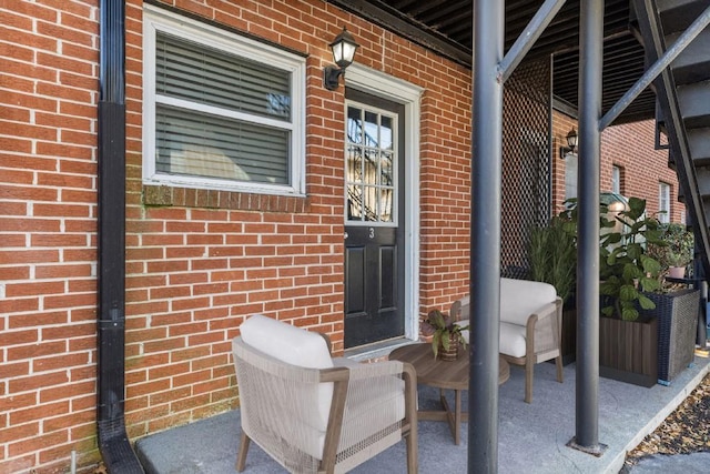 property entrance with a patio