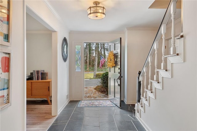 foyer with ornamental molding