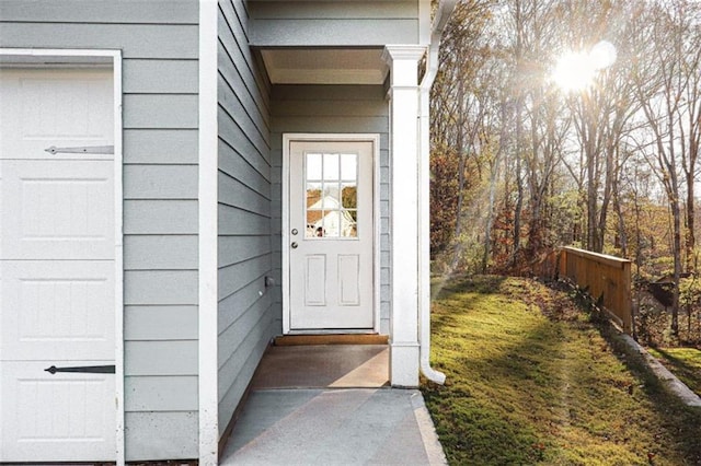 property entrance featuring a garage