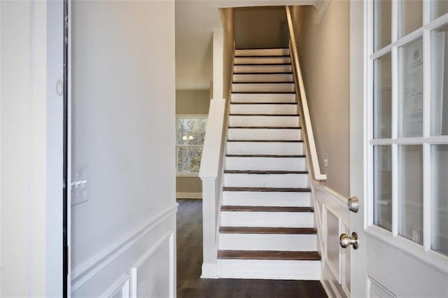 stairway with wood-type flooring