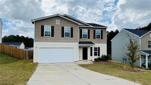 view of front facade featuring a garage and a front lawn