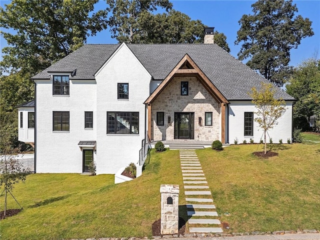 view of front of property with a front lawn