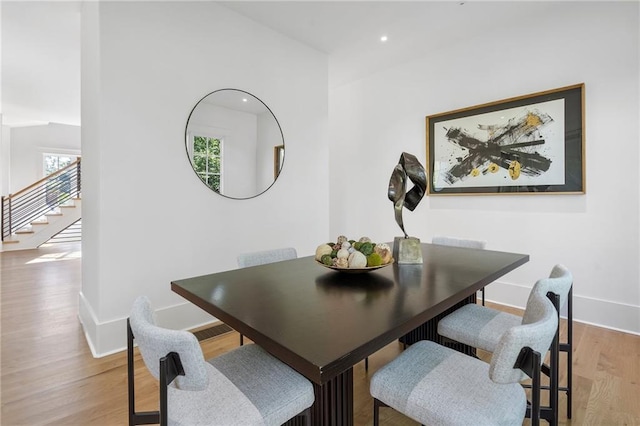 dining area with light wood-type flooring