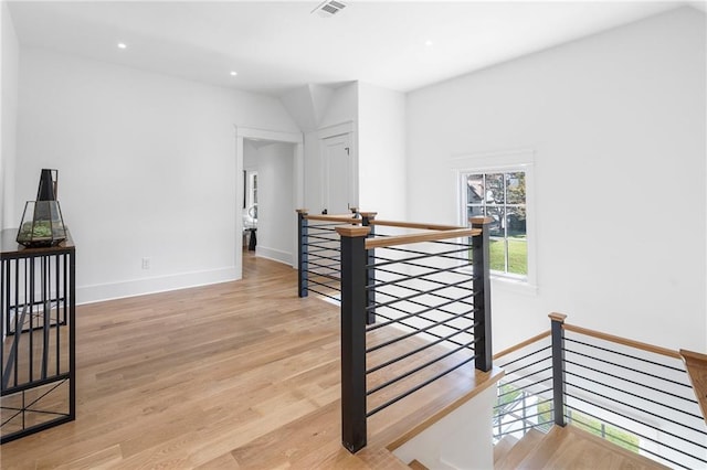 corridor featuring light hardwood / wood-style floors