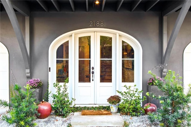 property entrance featuring french doors