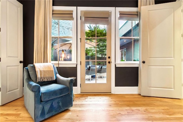 doorway with light hardwood / wood-style floors