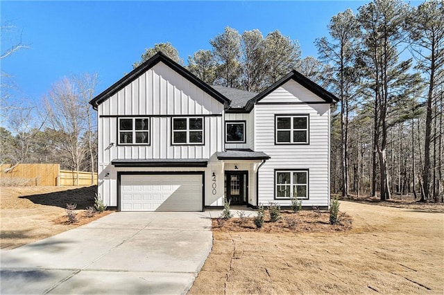 modern farmhouse style home featuring a garage