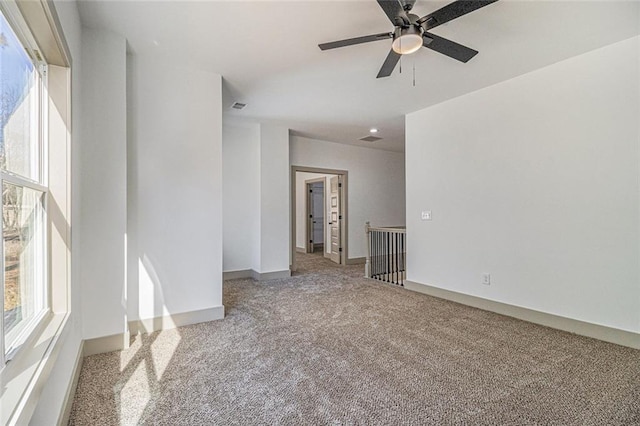 spare room featuring carpet flooring