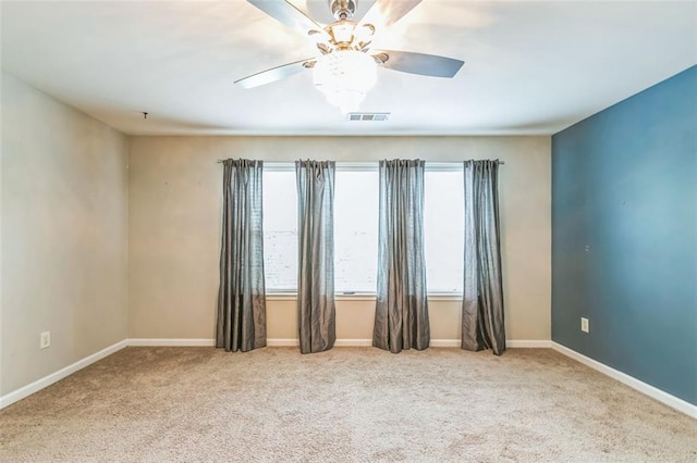 4358 Grove Field Ct, Suwanee, GA 30024 - carpeted empty room featuring healthy amount of natural light and a ceiling fan