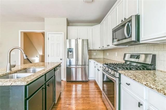 4358 Grove Field Ct, Suwanee, GA 30024 - bathroom with double vanity, a garden tub, and baseboards