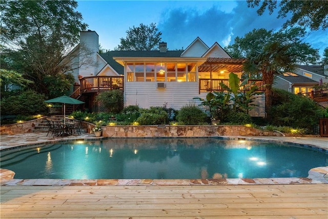 4820 Coppedge Trl, Peachtree Corners, GA 30096 - rear view of property with a wooden deck, an outdoor pool, a chimney, and stairway