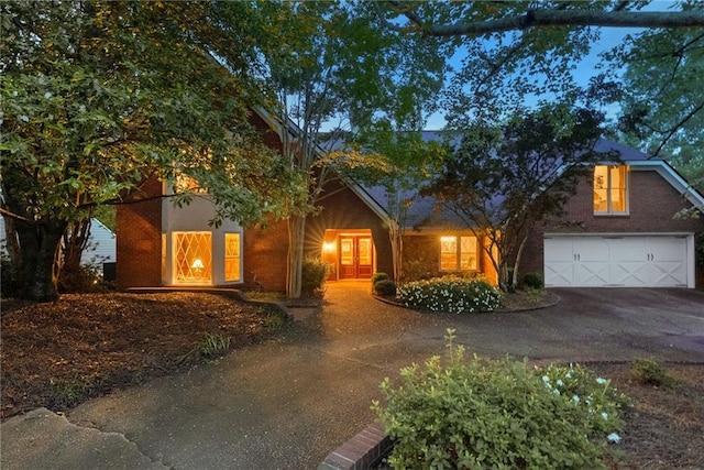 4820 Coppedge Trl, Peachtree Corners, GA 30096 - view of front of property featuring driveway, a garage, and brick siding