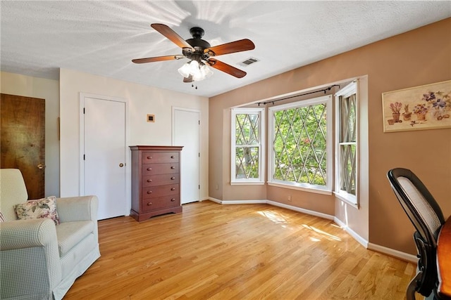 4820 Coppedge Trl, Peachtree Corners, GA 30096 - living area with light wood-type flooring, baseboards, and ceiling fan