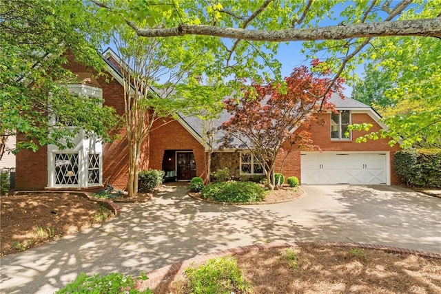 4820 Coppedge Trl, Peachtree Corners, GA 30096 - view of front facade with driveway, brick siding, and a garage