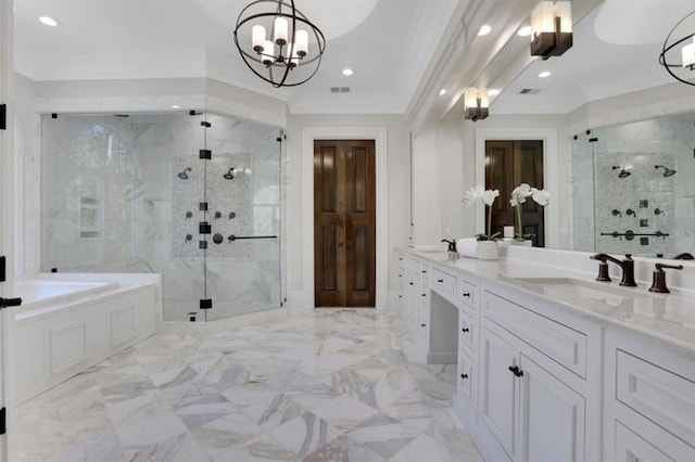 821 Camden Park Ct, Atlanta, GA 30342 - bathroom featuring a garden tub, double vanity, a marble finish shower, a chandelier, and crown molding