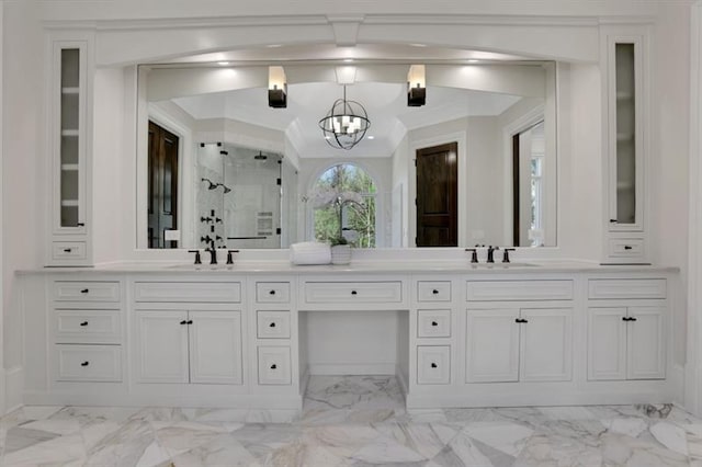 821 Camden Park Ct, Atlanta, GA 30342 - full bath featuring marble look tile flooring, a stall shower, double vanity, and a chandelier