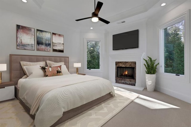 821 Camden Park Ct, Atlanta, GA 30342 - bedroom featuring multiple windows, recessed lighting, a high end fireplace, and a ceiling fan