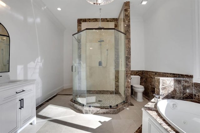 821 Camden Park Ct, Atlanta, GA 30342 - full bath featuring a stall shower, a whirlpool tub, vanity, and recessed lighting