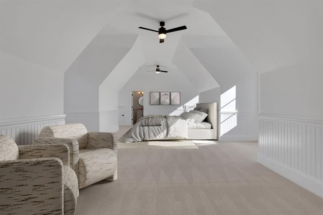 821 Camden Park Ct, Atlanta, GA 30342 - carpeted bedroom with lofted ceiling, wainscoting, and ceiling fan