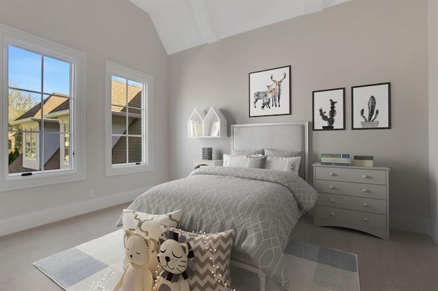 821 Camden Park Ct, Atlanta, GA 30342 - bedroom featuring vaulted ceiling and carpet floors