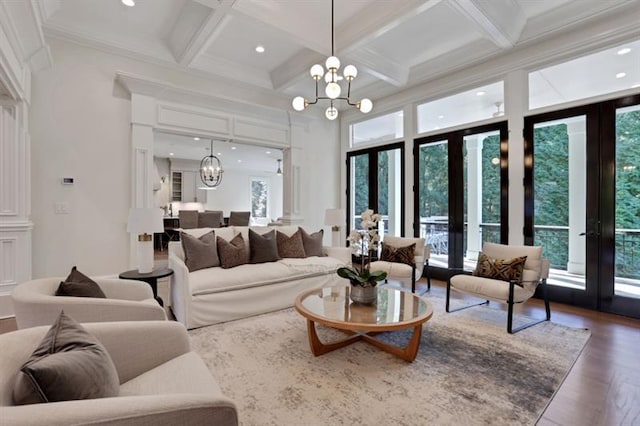 821 Camden Park Ct, Atlanta, GA 30342 - living area with a chandelier, french doors, wood finished floors, coffered ceiling, and beam ceiling